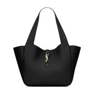 “Elegant grained leather tote bag with bronze hardware and suede lining