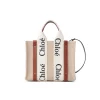 Small Chloé Woody woven basket bag with logo handles and brown leather trim