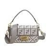 A pair of Fendi bags: leather mini tote and FF monogram shoulder bag, showcasing different textures.