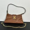High-end Celine brown leather handbag with elegant gold chain and logo