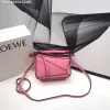 Loewe Puzzle bag crafted from calfskin leather with geometric stitched panels.