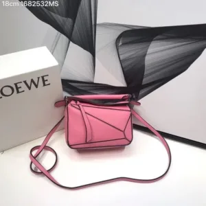Loewe Puzzle bag crafted from calfskin leather with geometric stitched panels.