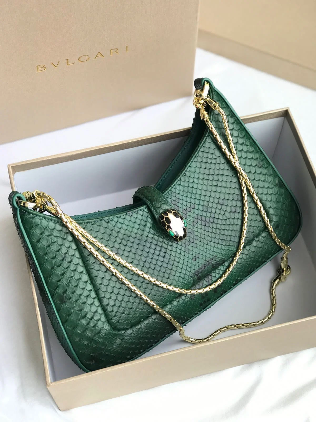 bvlgari Serpenti Baia Shoulder Bag Bvlgari Serpenti Forever top handle bag in emerald green crocodile or python skin.