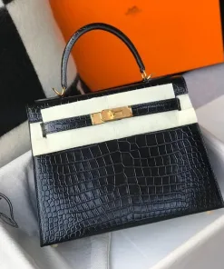 Full front view of the structured mini top handle bag in deep burgundy shiny alligator leather with silver-tone hardware.