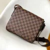 High-end crossbody bag with beige and brown check pattern and adjustable strap