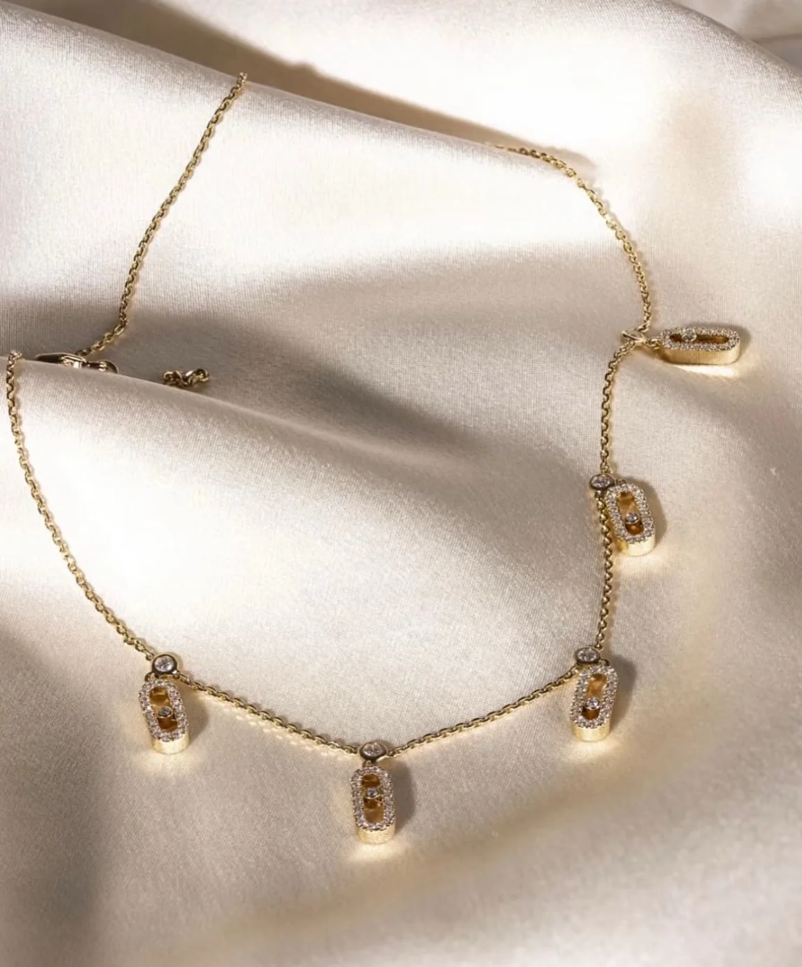 Minimalist Pavé Link Station Necklace Detailed shot of the oval link stations on the plated necklace, highlighting the brilliance of the pavé-set cubic zirconia crystals.