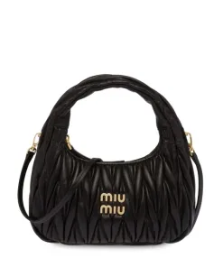 Black Miu Miu Mini Wander bag showing matelassé stitching and gold-tone logo lettering