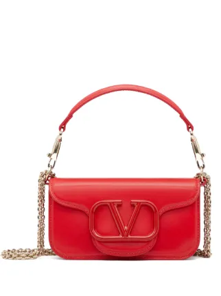 Red Designer Leather Shoulder Bag With Logo Red leather shoulder bag featuring gold chain strap and oversized logo plaque