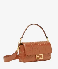 Side profile of the black calfskin Fendi Baguette, showing the 6cm depth and the quality of the durable leather.