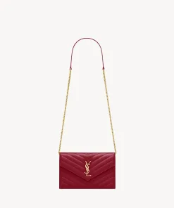 Small chain wallet with leather-reinforced strap for shoulder or crossbody wear”