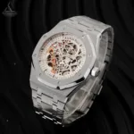 Men's Audemars Piguet Royal Oak watch showing the brushed and polished finishes on the steel bracelet and case.