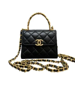 Chanel Small Flap Bag in deep black quilted leather with gold hardware.