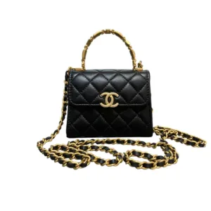Chanel Small Flap Bag in deep black quilted leather with gold hardware.