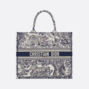 Full view of the Dior Book Tote in blue and white Toile de Jouy Sauvage jungle print canvas