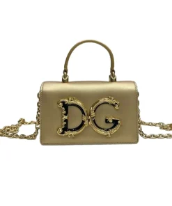 Front view of the gold Devotion mini bag with the large, ornate gold DG logo and top handle.