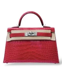Elegant mini structured handbag crafted from genuine crocodile leather, showcasing the iconic gold hardware.
