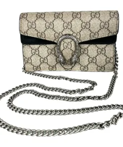 Luxury-inspired suede-trim shoulder bag featuring chain strap