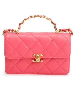 Chanel Small Flap Bag in rose pink quilted leather with gold hardware.
