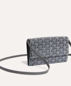 Open designer wallet displaying organized storage sections