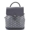 Detailed view of the signature repeating geometric pattern on the stylish mini travel backpack.