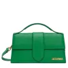 Green Jacquemus Le Grand Chiquito handbag shown from the front with top handle and gold logo.