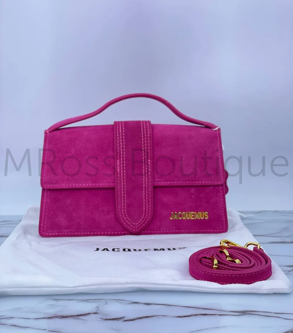 Elegant pink Jacquemus purse with minimalist design and smooth leather texture.