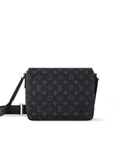 Sleek compact messenger bag featuring durable canvas and an adjustable shoulder strap