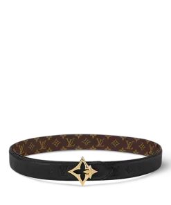 Close-up of Flowergram reversible belt with floral gold-tone buckle”