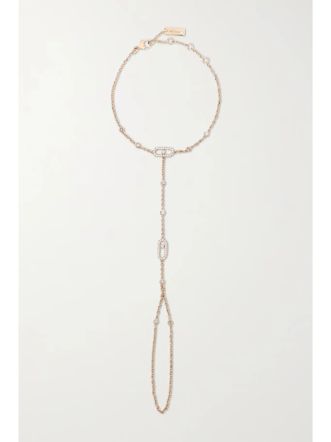 18K Rose Gold Diamond Hand Chain with Floating Stone Design Close-up of 18K rose gold hand chain with floating diamond detail”