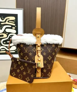 Louis Vuitton All In BB shoulder bag in classic brown Monogram coated canvas with gold-tone hardware and leather straps
