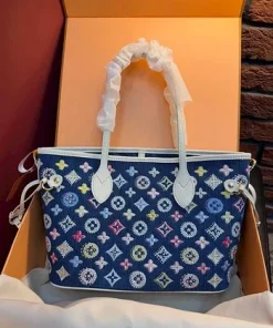 Women’s denim monogram tote bag with zipper closure and detachable shoulder strap