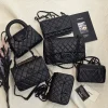 Chanel black quilted leather handbags in mini, small, and medium sizes=