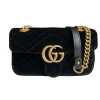Gucci GG Marmont Velvet Mini Bag in black velvet with signature chevron pattern, antique gold hardware, and heart stitching.