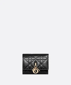 Close-up view of Dior Veronia wallet showcasing refined lambskin texture and craftsmanship