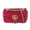 Gucci GG Marmont mini velvet shoulder bag with chevron texture, iconic GG logo plaque, chain strap and flap closure