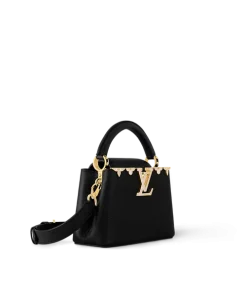 Elegant black Louis Vuitton Capucines Mini bag with mother-of-pearl Monogram flowers