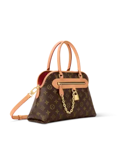 Woman carrying Louis Vuitton Ever More PM tote bag with removable leather strap and double handles in Monogram canvas