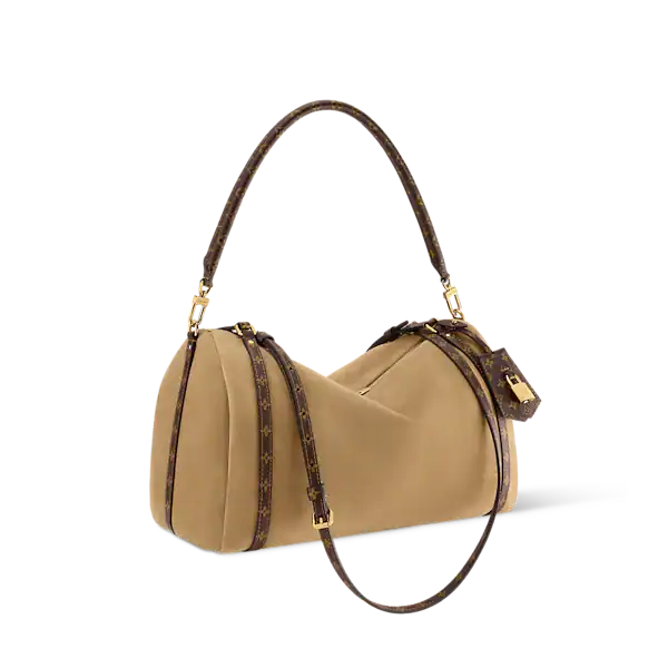 Side view of Louis Vuitton Express MM bag showcasing soft Hazelnut suede and adjustable cowhide leather strap.