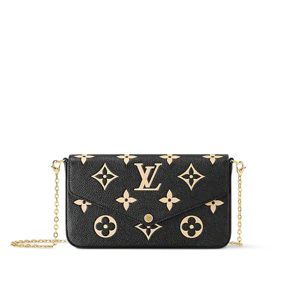 Louis Vuitton Pochette Félicie styled with silver chain strap and open interior pockets