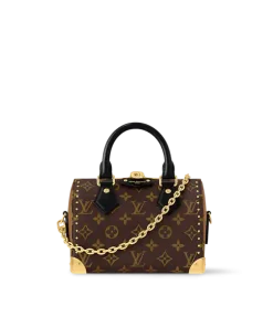 Close-up of Louis Vuitton Speedy Trunk 20 bag in brown Monogram canvas with gold-tone padlock and chain