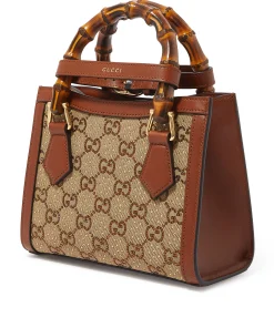 Gucci Diana Crystals small tote showing bamboo handles, detachable gold chain strap, and compact design