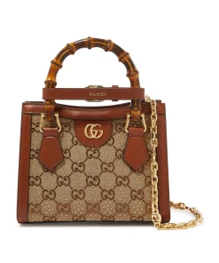 Front view of Gucci Diana Crystals small tote in camel GG canvas with sparkling crystals and brown leather trim
