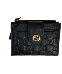 Compact embossed black leather wallet with snap closure