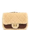 Chanel brown shearling quilted flap bag crafted with soft lambskin leather and gold CC lock