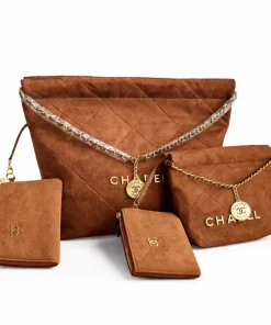 Brown quilted suede Chanel handbag set with matching pouch and gold chain details