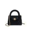 Black velvet mini top handle handbag with gold hardware