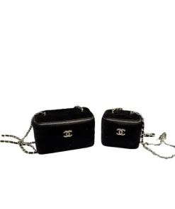 Black Chanel mini quilted crossbody bag with chain strap