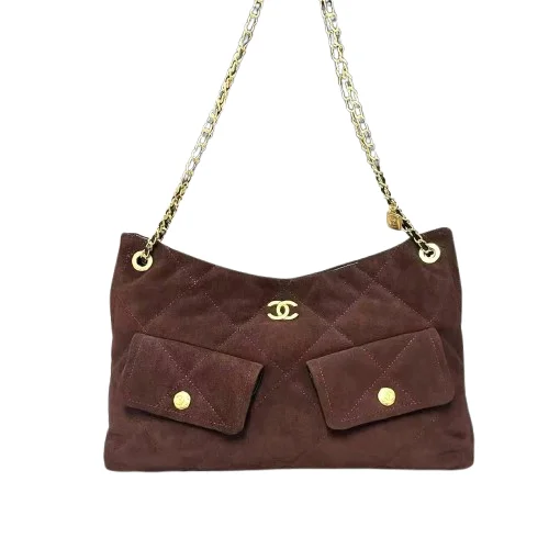 Front view of black Chanel Maxi Hobo bag showing quilted design and gold hardware