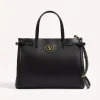 Adjustable side buckle detail on Valentino Antibes medium leather bag