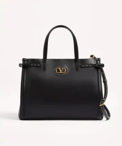 Adjustable side buckle detail on Valentino Antibes medium leather bag